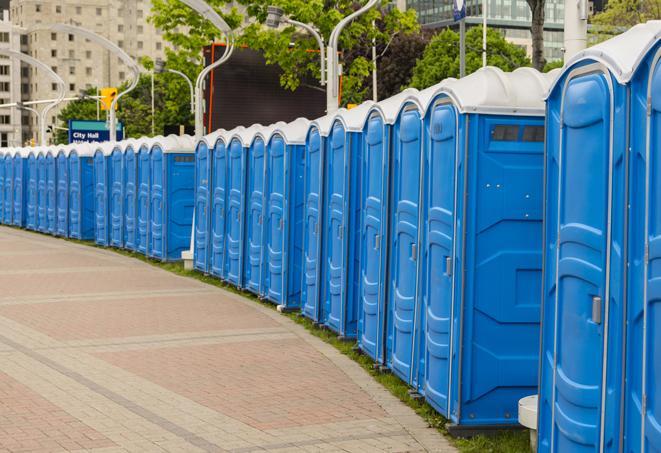 colorful portable restrooms available for rent at a local fair or carnival in Columbus, WI